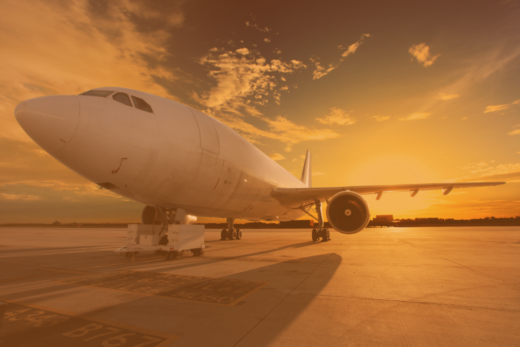 airplane sunset orange