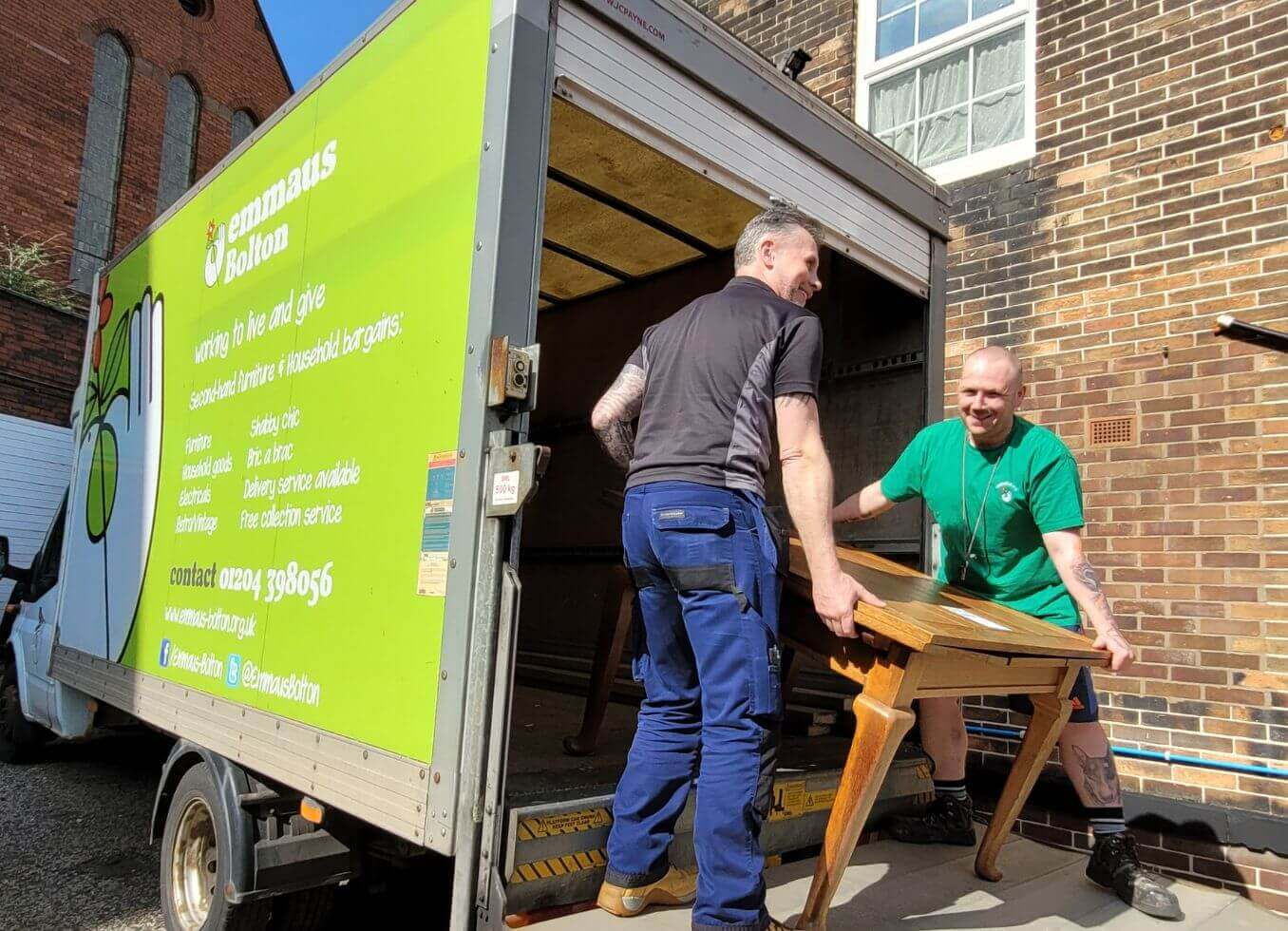 Emmaus Bolton Charity unloading donations from van